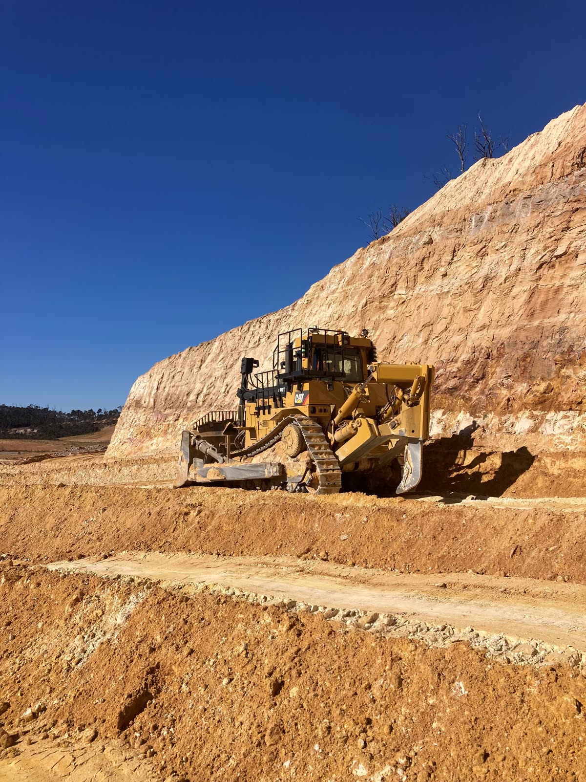 CAT D10 dozer on hire pushing dirt on a mine site