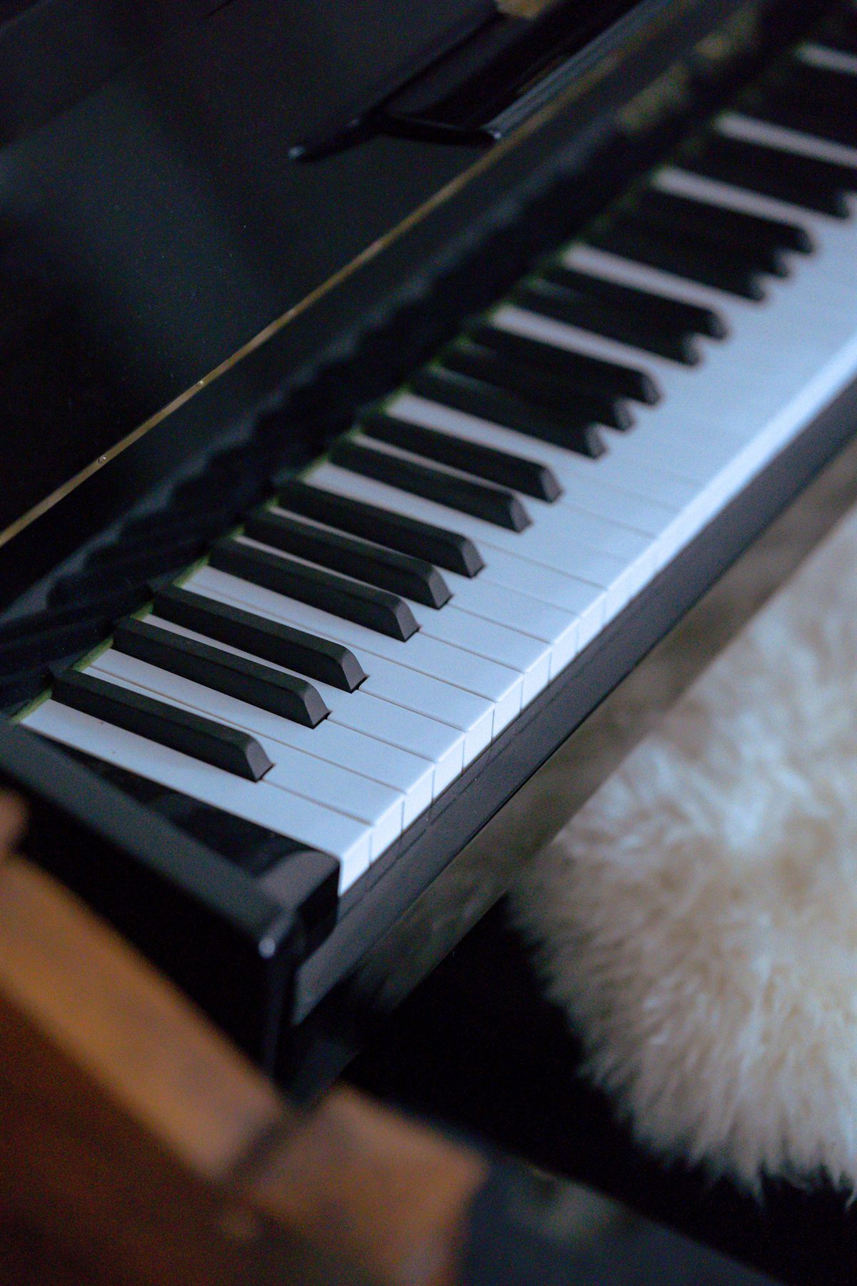 A black piano keyboard seen from above