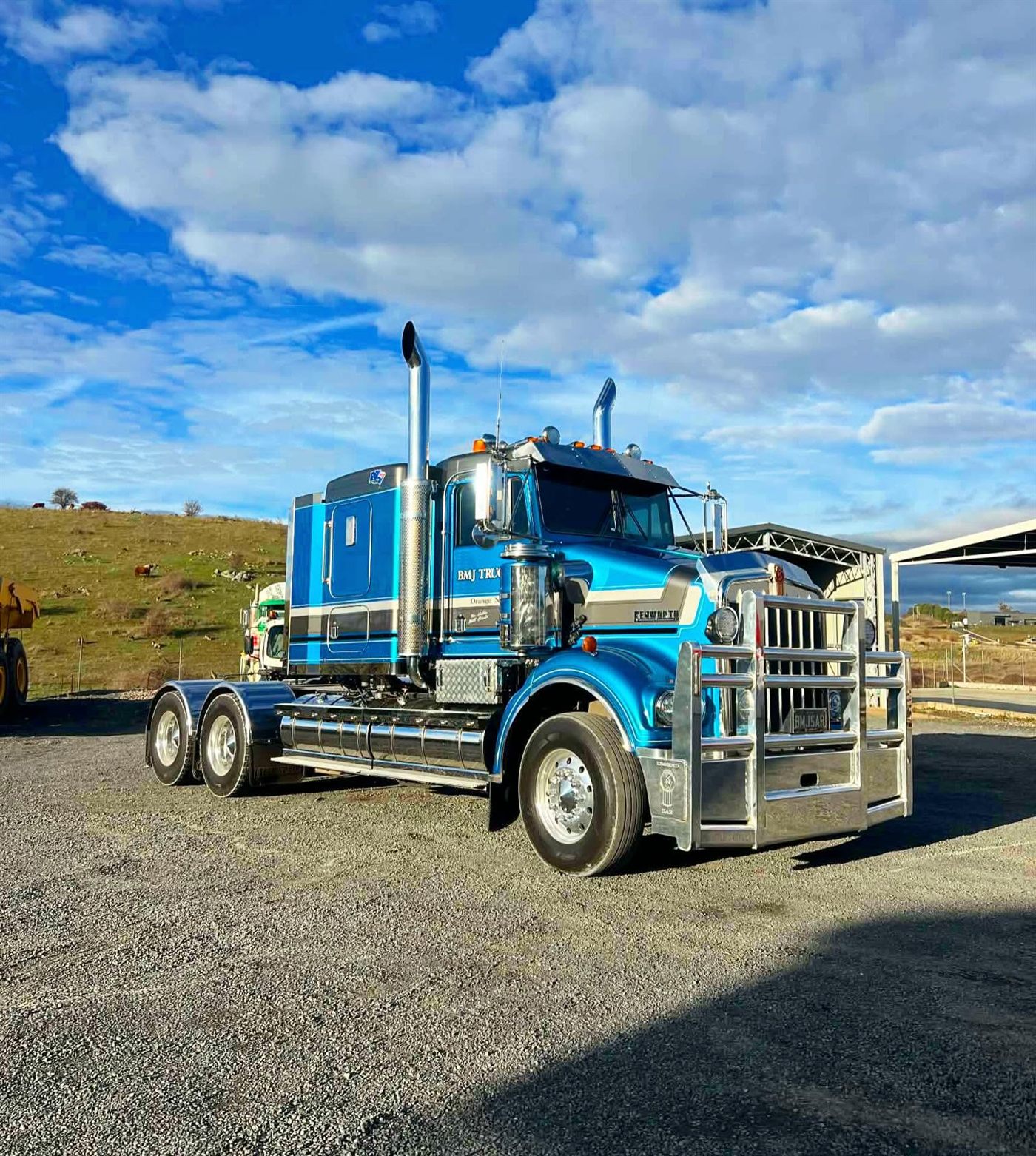Blue Kenworth prime mover from a local Orange fleet outside the workshop